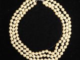 three strand pearl necklace with silver clasp