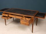 an image of a desk with two drawers and a black leather top