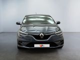 the front view of a black car in a white room