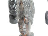 three different types of head sculptures on a white background