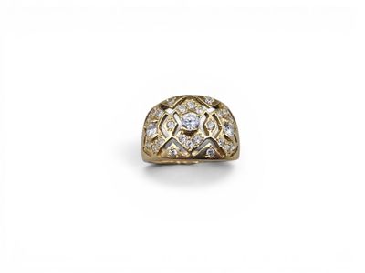 a yellow gold ring with a diamond set in the center
