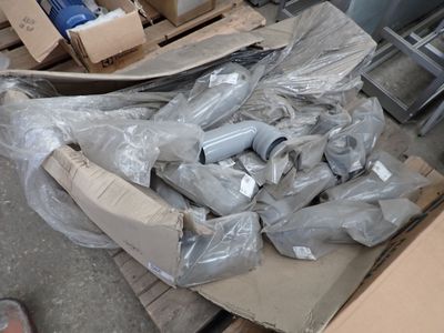 a pile of assorted items sitting on a pallet