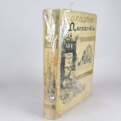un livre sur la couverture duquel figure l'image d'un château