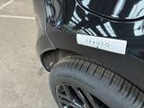 a close up of a car with a sticker on the side of it