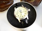 a watch that is sitting in a box on a table