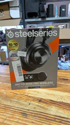 a box of headphones on a table in a store