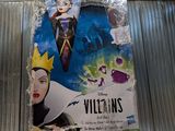 a doll of a maleficent with a crown on it ' s head