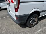 an image of a white van parked in a parking lot