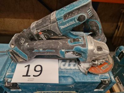deux outils électriques posés sur une boîte bleue