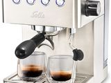 the espressor machine has two cups of coffee in it