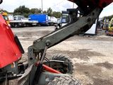 an image of a tractor that is parked in a lot