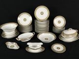 a picture of a table setting with a lot of plates and saucers