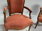 pair of antique chairs with upholstered upholstered back and arms