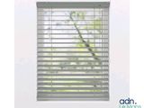 a close up of a window with a blind on it