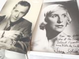 two old photos of a man and a woman holding a baby