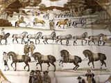 a picture of a picture of horses and people
