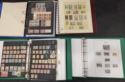 many different types of stamps in a binder on a table