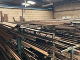 a large room full of wooden planks in a warehouse