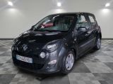 a picture of a small black car parked in a garage