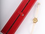 an image of a red box with a watch inside of it