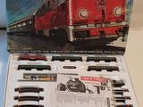 a box with a train set in it on a table