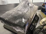 an image of a toaster sitting on a counter in a kitchen