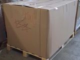 a large box sitting on a pallet in a warehouse