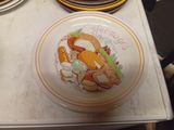 a plate with a sandwich on it sitting on a table