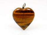 heart shaped tiger eye stone pendant with a silver bail