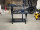 a bike repair stand in the middle of a room