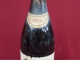 a bottle of wine that is sitting on a table