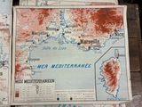 several maps of the mediterranean region of france on a wooden table