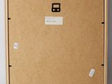 an empty cardboard box with a sticker on the front of it