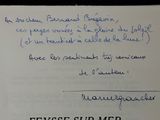 a piece of paper that has a handwritten message on it