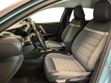the interior of a car with two seats and a steering wheel