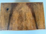 a piece of wood that has been cut in half