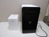 a white box and a black box sitting on a table