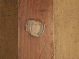 a piece of wood that has a label on it