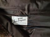 the label on the jacket is clearly visible on the fur