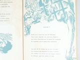 an open book with a picture of a cat on it