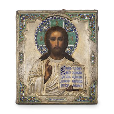 une icône ancienne représentant Jésus tenant une croix et une plaque