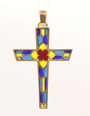 a close up of a cross on a white surface with a white background