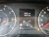 a close up of a car dashboard with various gauges