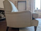 a chair that is sitting in the middle of a room