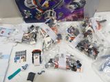 a box of legos sitting on a table next to a box of legos
