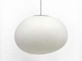 an image of a white light hanging from a ceiling