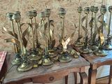 a lot of candles that are sitting on a table