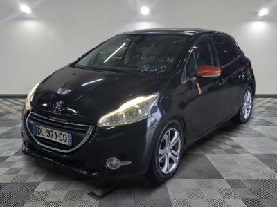 a picture of a black car parked in a garage