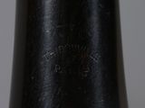 a close up of a black vase with a white background