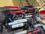 a lot of guns that are sitting on a table